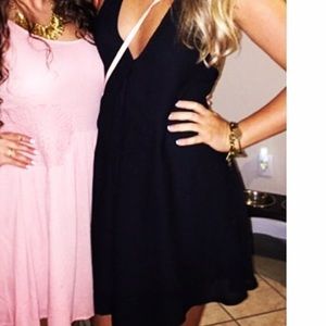 Black plunge neckline swing dress racerback